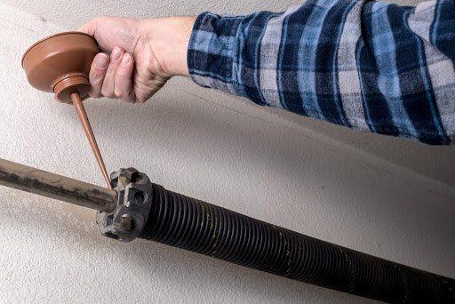 How Do I Lubricate a Garage Door?