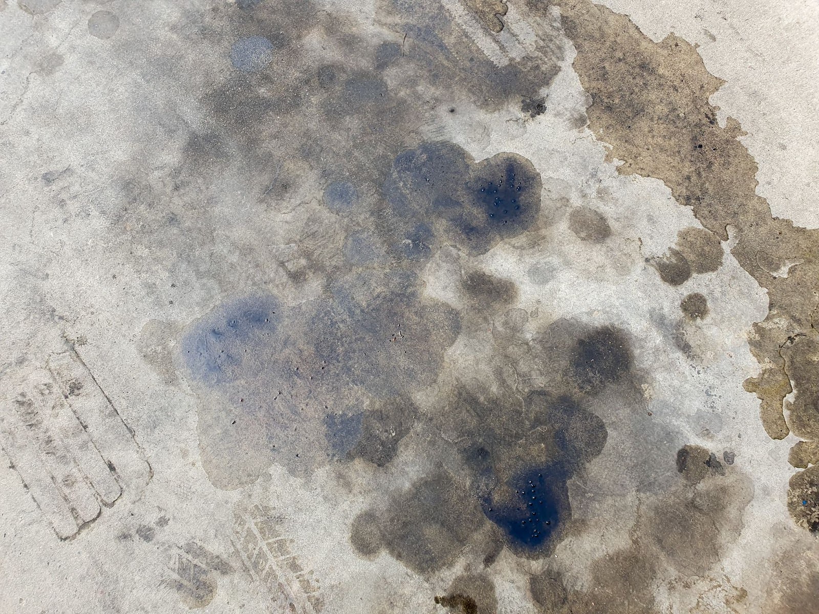 How to Remove Oil Stains on Your Garage Floor